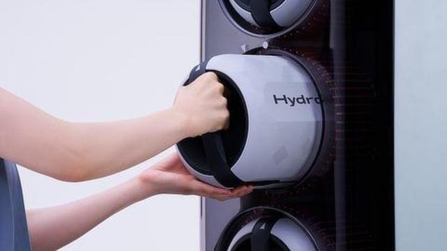 Toyota’s Swappable Hydrogen Fuel Cells Boost EV Range—No Pitstops Needed